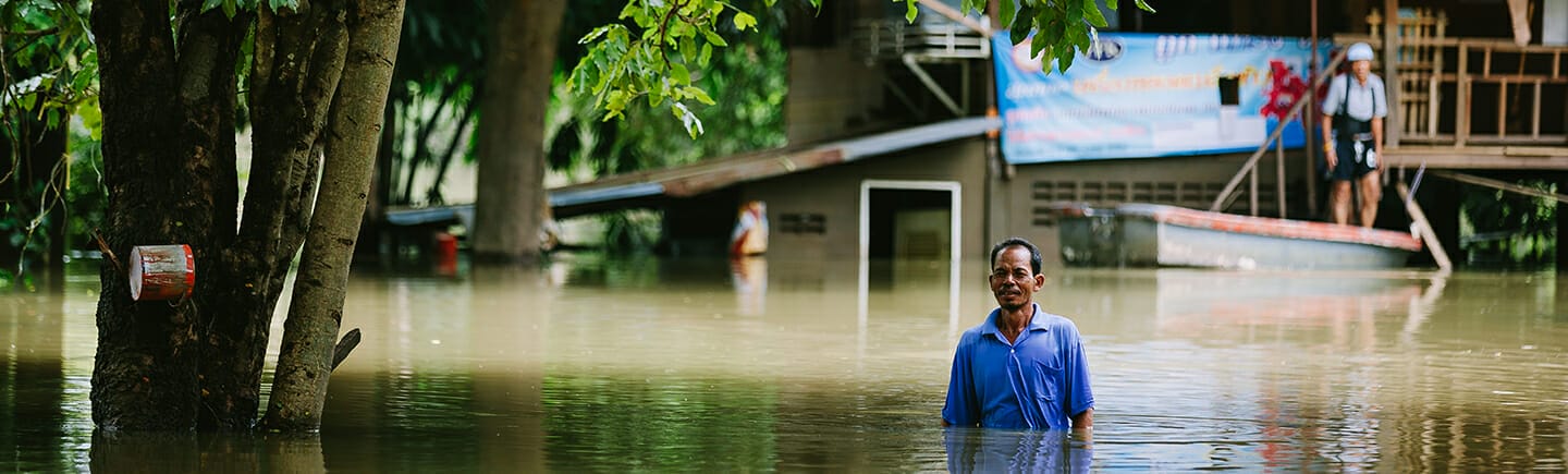 
		man-standing-in-flood		