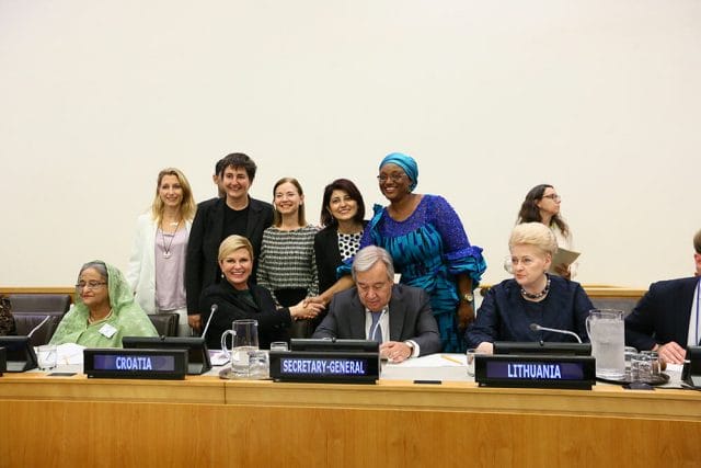 Awardees posing with UN Secretary General